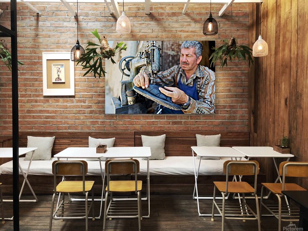 Shoemaker working in Aleppo souq in Syria Reproduction