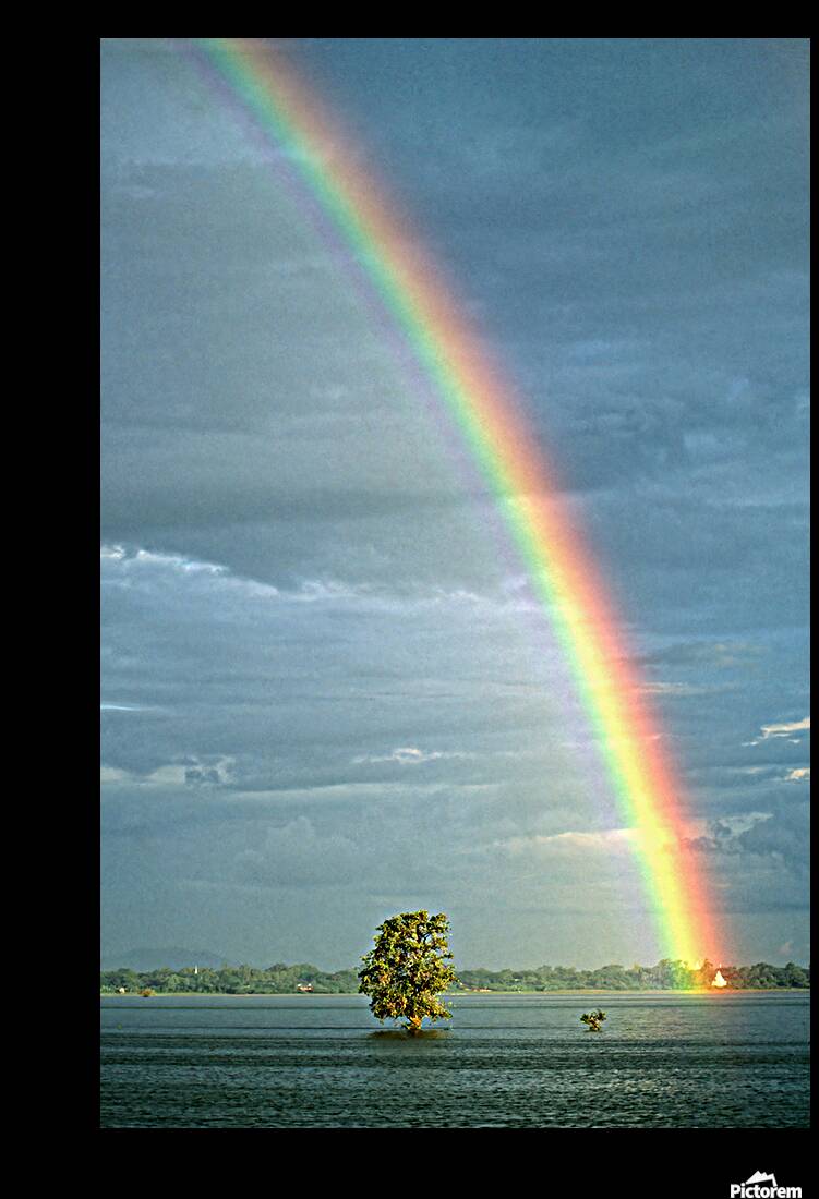 Rainbow shines over landscape in Myanmar after rainfall Reproduction