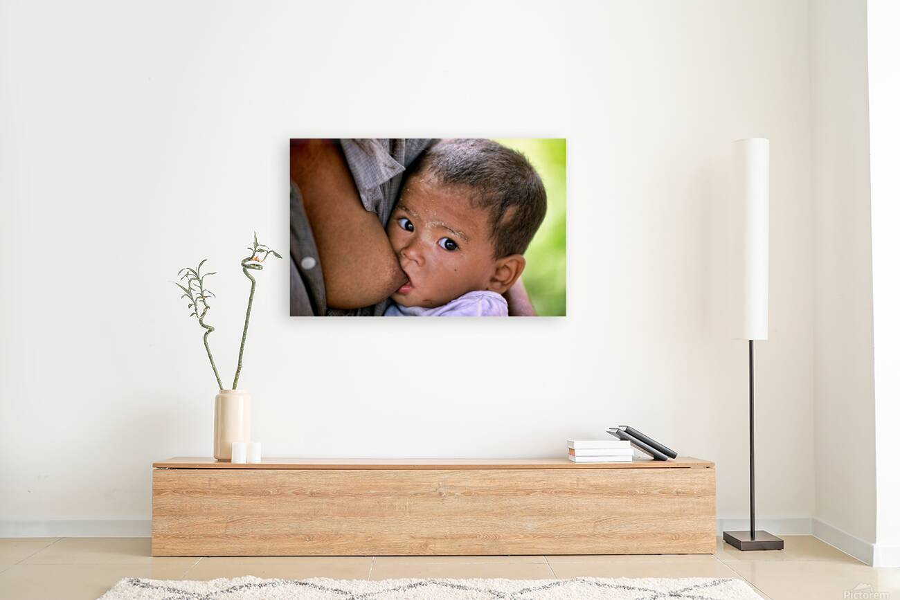 Feeding a baby in Myanmar during daytime hours Reproduction