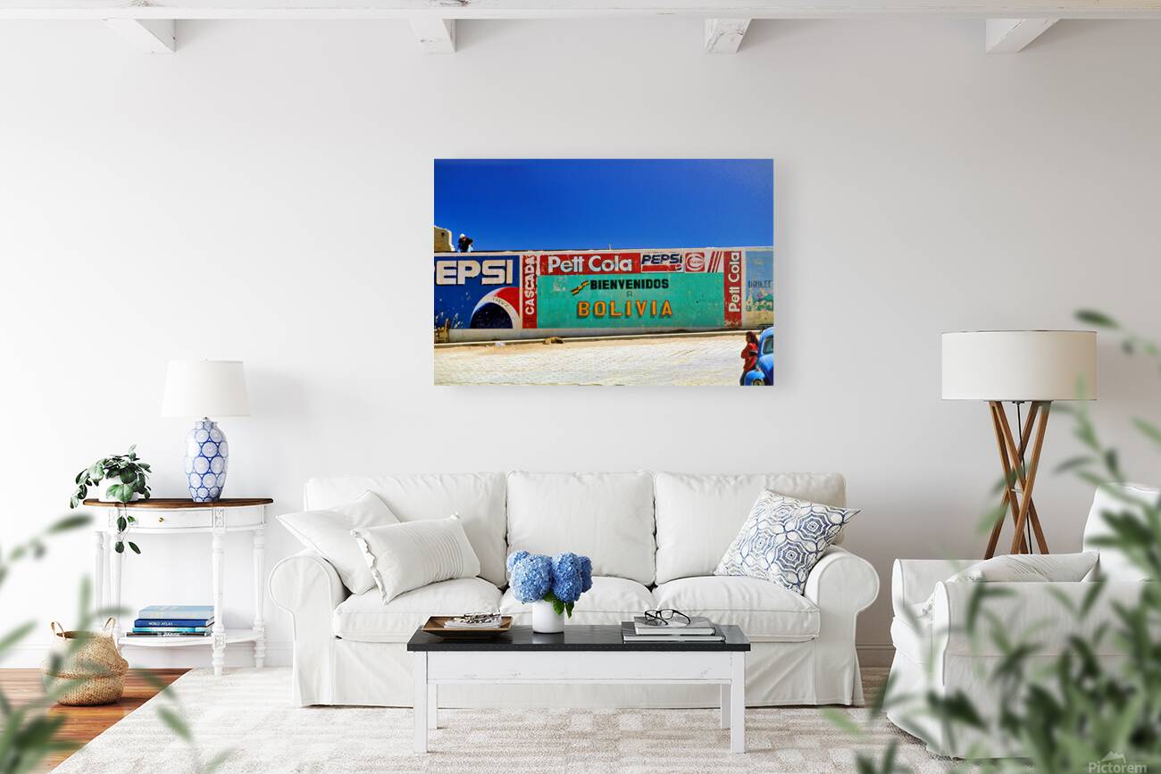 Welcome to Bolivia sign on a wall with old ads. Reproduction