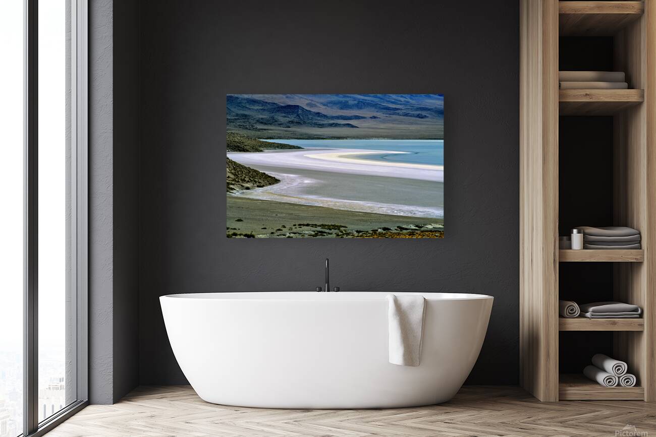 Scenic desert lake with white shore and rocky mountains. Reproduction