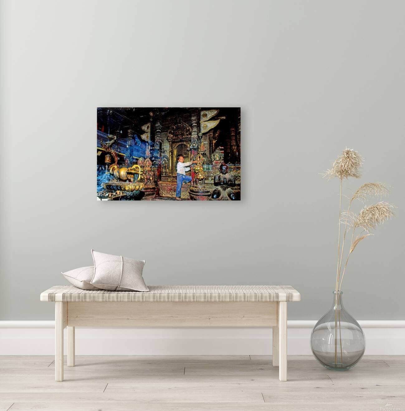 Boy interacts with religious artifacts in Kathmandu temple Reproduction