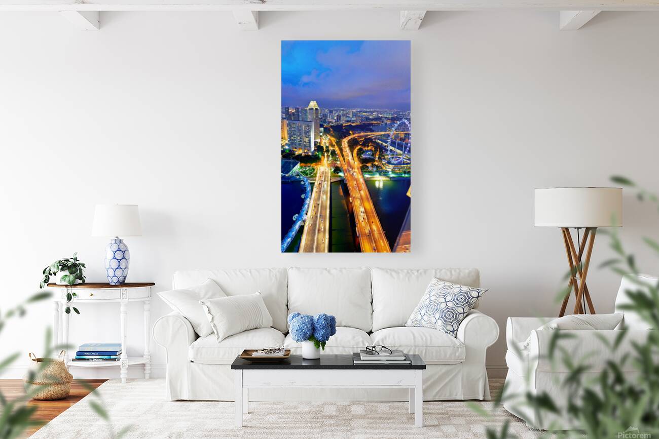 City lights shine in Marina Bay as sunset brings night activity Reproduction