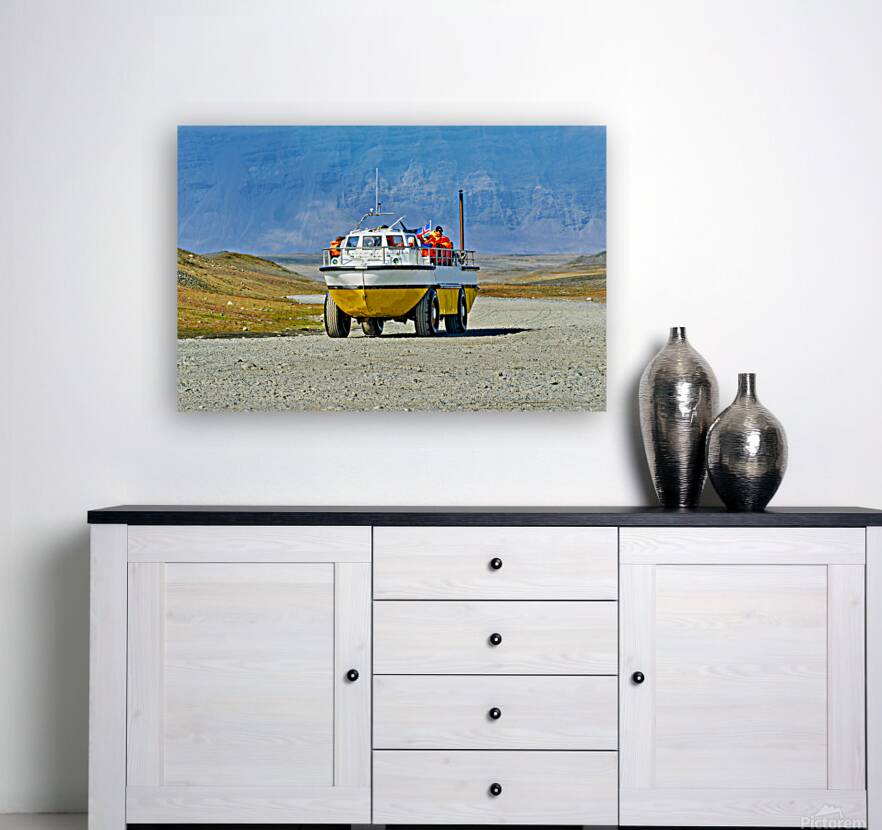 Exploring Jokulsarlon Glacier Lagoon with amphibian vehicle Reproduction