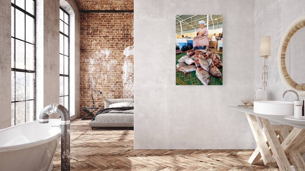 Man sells fresh fish at Muscat Oman fish market today Reproduction