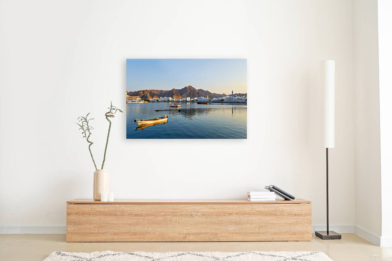 Waterfront view in Muscat Oman at sunset near boats Reproduction