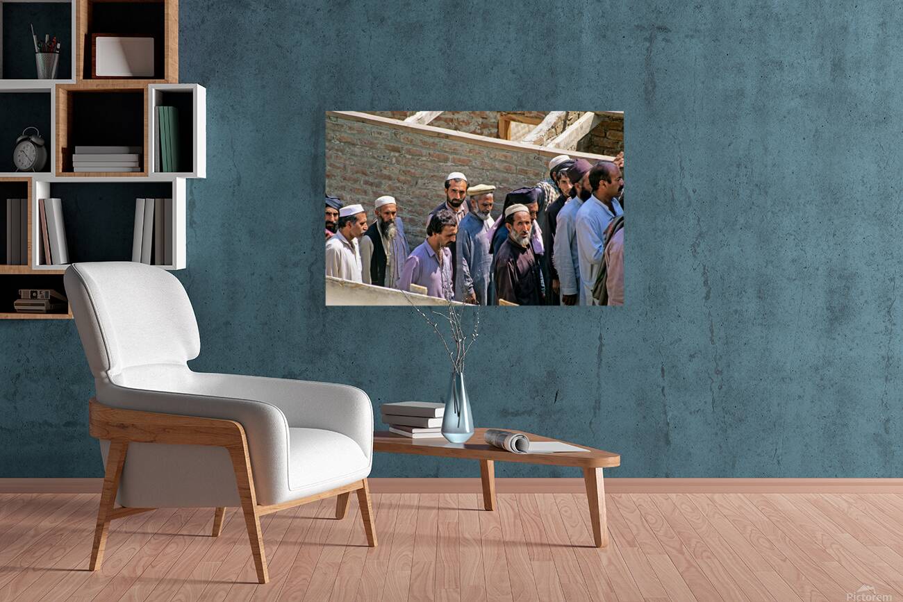 Men heading to work in Peshawar streets during morning hours Reproduction