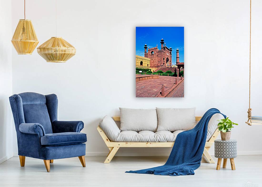 Mosque stands tall in Lahore with clear blue sky above Reproduction