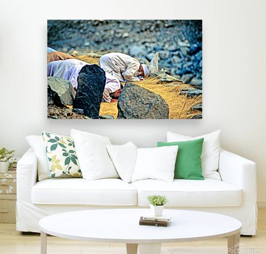 Muslim men pray towards Mecca in Pakistan during prayer time Reproduction