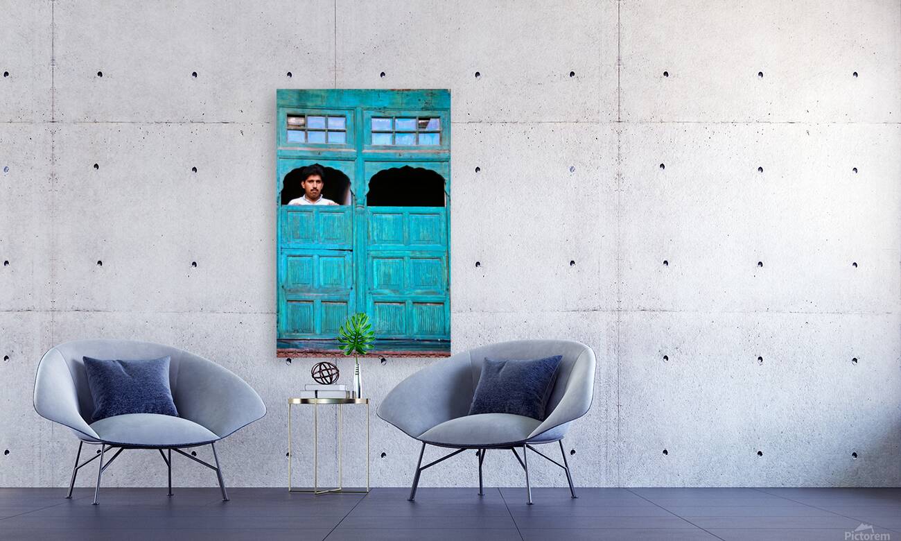 Man looks out from window in Lahore Pakistan Reproduction