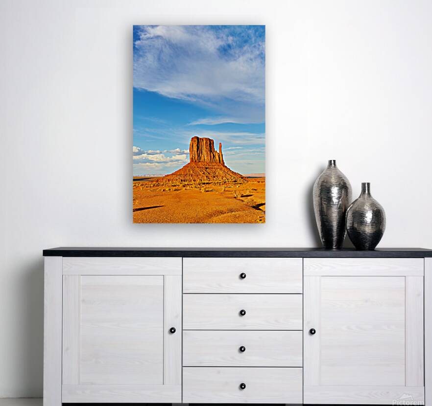 Monument Valley shows red rock formations under blue sky Reproduction