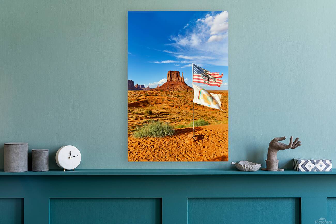 Monument Valley displays flags under blue sky in USA Reproduction