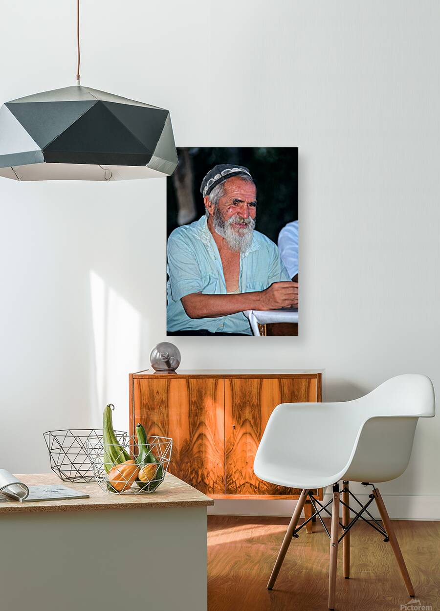 Elderly man smiles while sitting outdoors in Bukhara Uzbekistan Reproduction