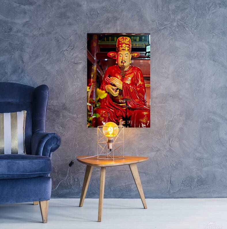 Statue of a deity in Hanoi Vietnam showing traditional clothing Reproduction