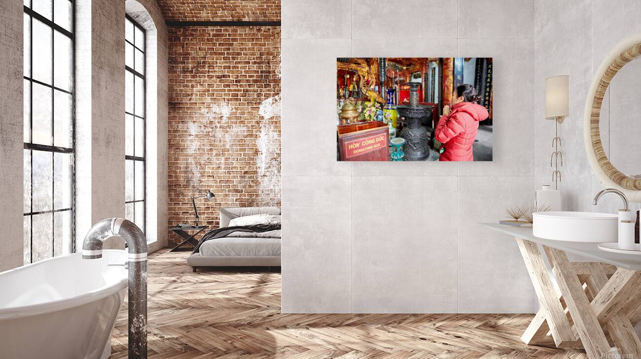 Praying at a temple in Ho Chi Minh City Vietnam Reproduction