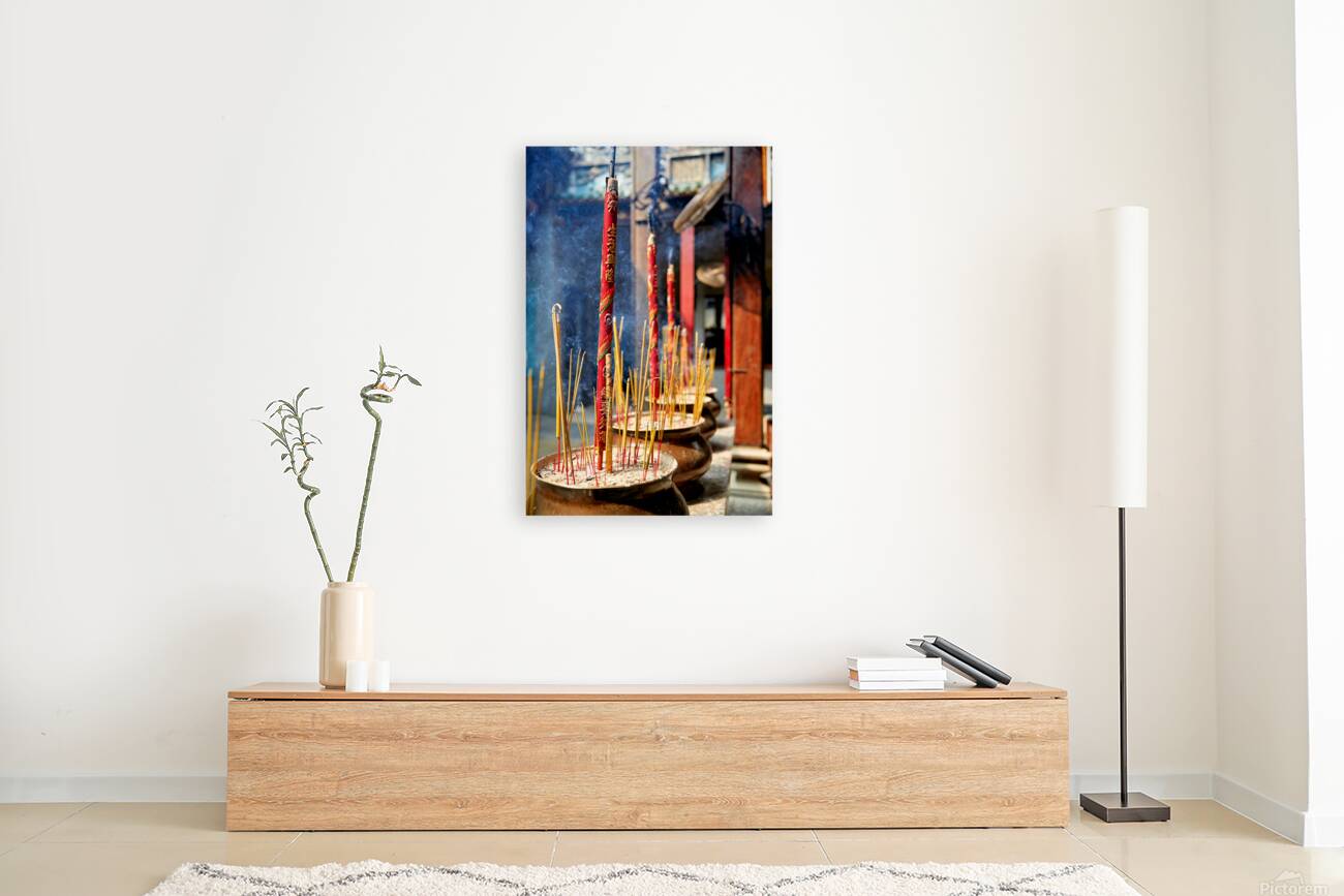 Incense sticks burning at a temple in Ho Chi Minh City Reproduction