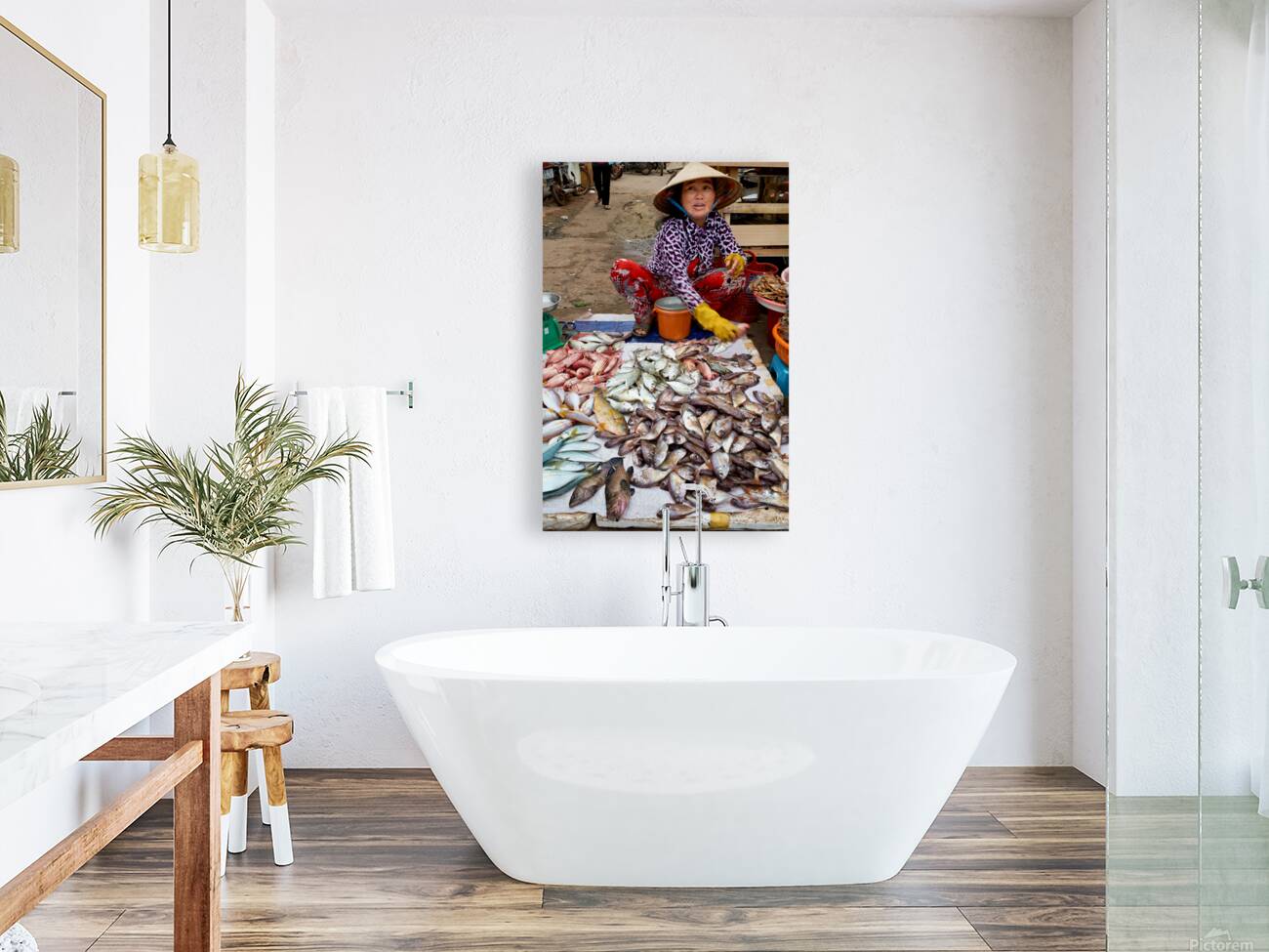 Fish seller in Phu Quoc market shows fresh catch for sale Reproduction