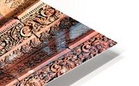 Ancient temple wall with intricate reddish stone carvings and co HD Metal print
