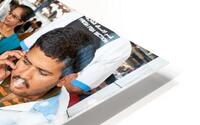 Man talks on phone at busy fish market in Dubai UAE HD Metal print