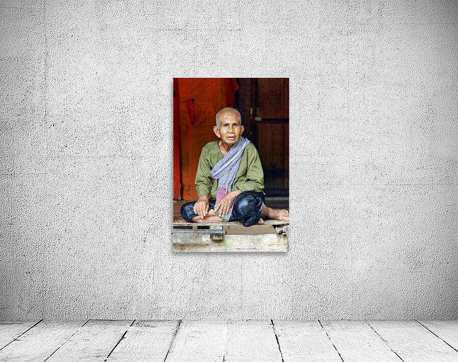 An old woman in her hut in Siem Reap. Angkor. Cambodia Wall Preview