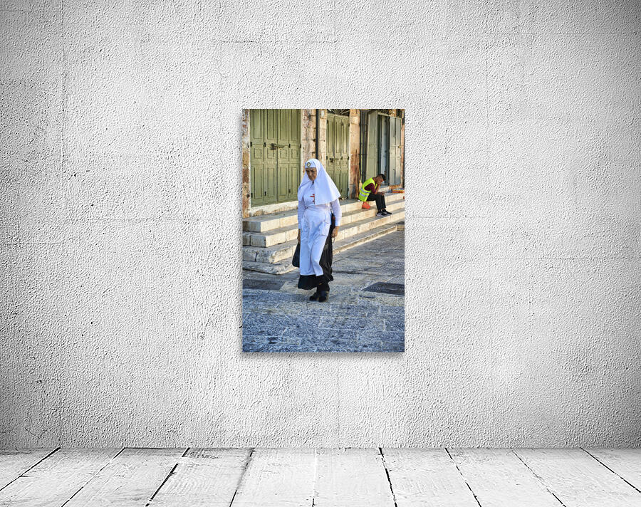 Jerusalem Israel. A nun in the streets of the old city Wall Preview