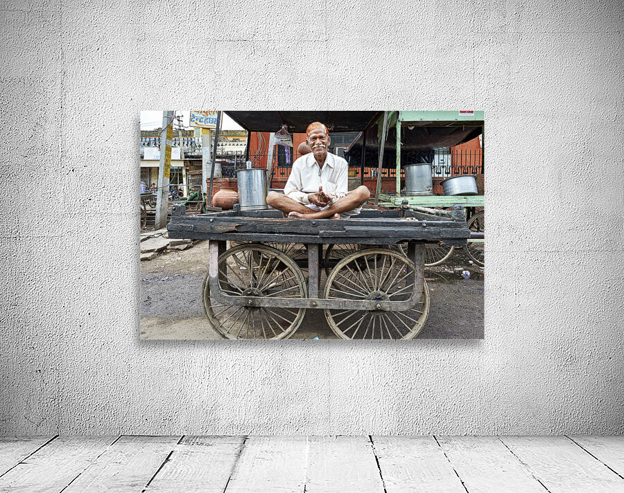 India Rajasthan Bundi. Portrait of an old man seated on a carty Wall Preview