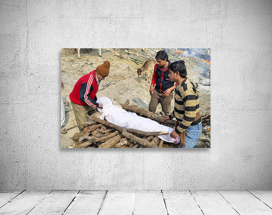 India. Varanasi Benares Uttar Pradesh. The sacred rite of hindu cremations by the river Ganges Wall Preview