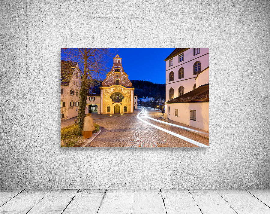 Germany Bavaria Romantic Road. Fussen. Heilig-Geist-Spitalkirche Holy Spirit Hospital Church and its rococo painted facade Wall Preview