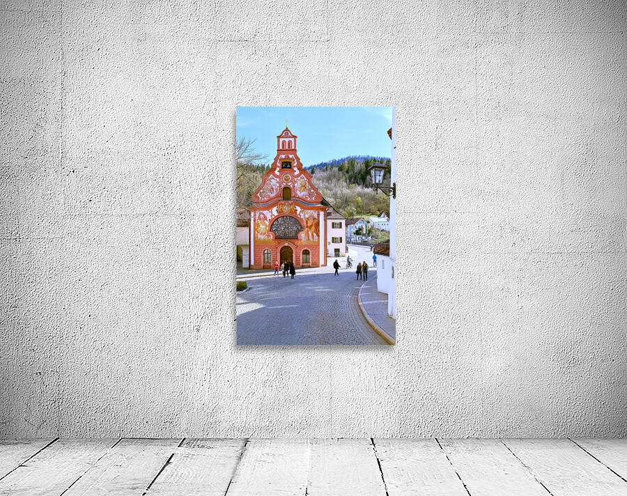 Germany Bavaria Romantic Road. Fussen. Heilig-Geist-Spitalkirche Holy Spirit Hospital Church and its rococo painted facade Wall Preview