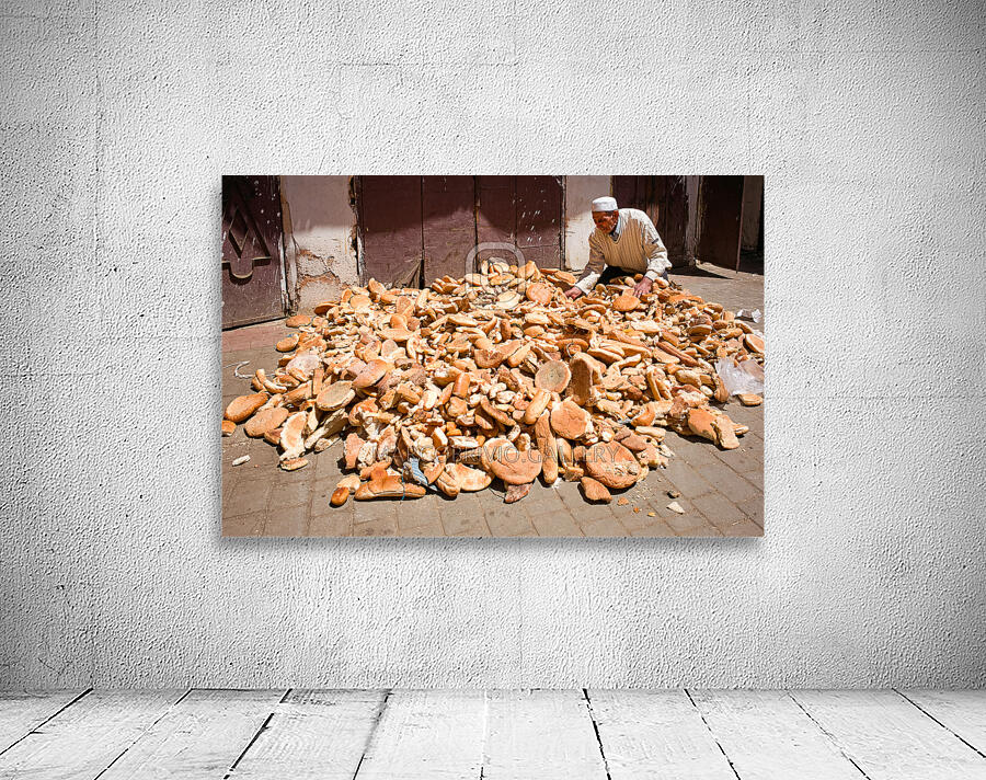 Morocco Meknes. Collecting loaf of bread Wall Preview