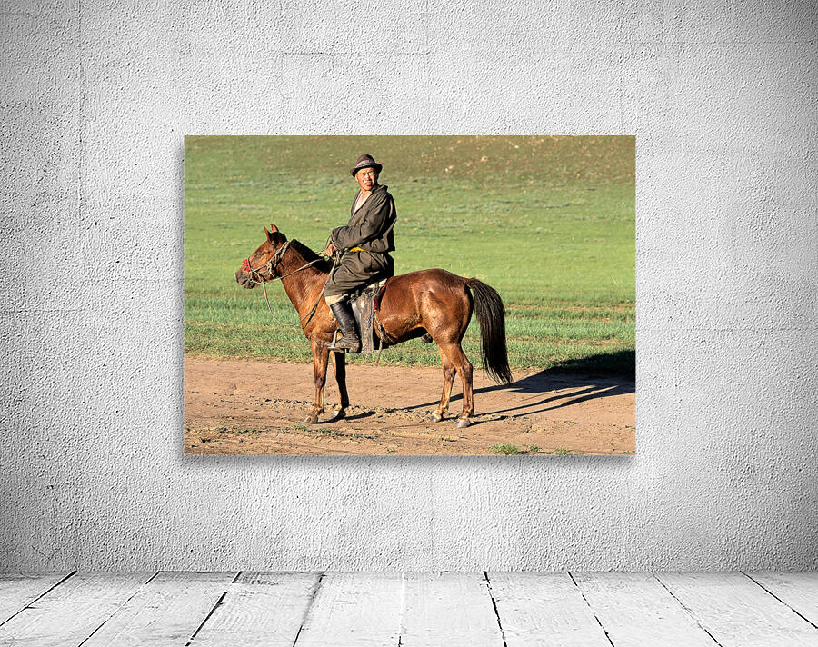 Mongolia. A sheperd riding his horse. Wall Preview