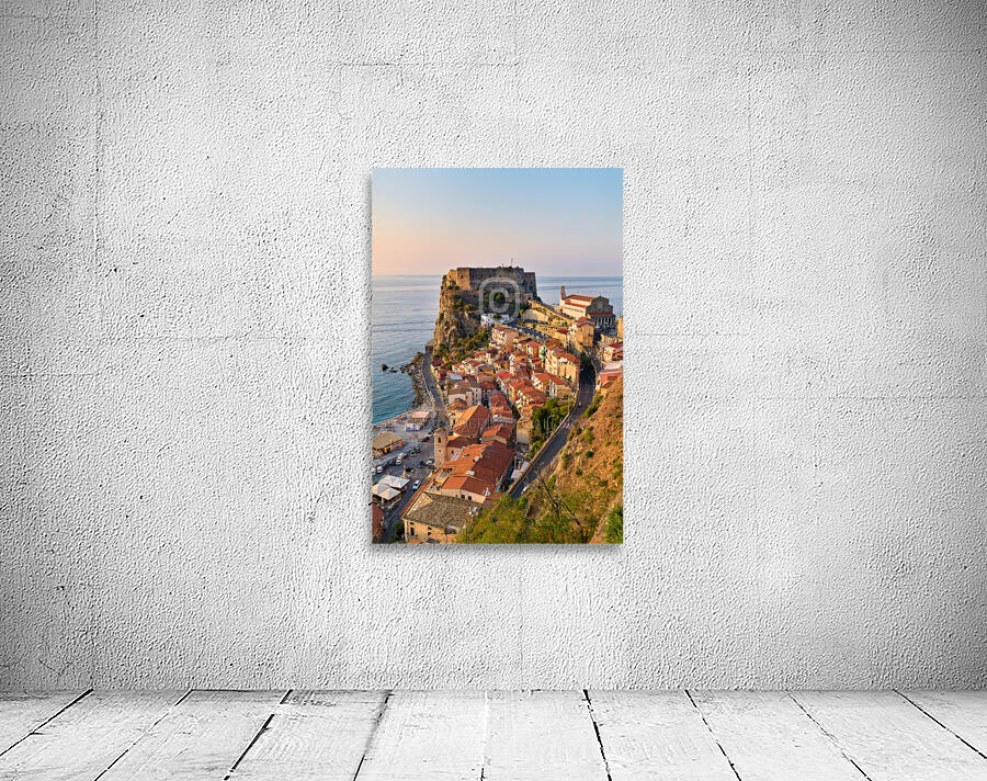 The city of Scilla Calabria Italy. Elevated view of the Ruffo castle at sunset Wall Preview