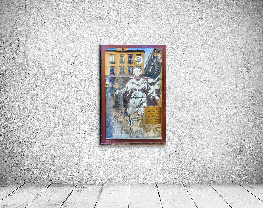 Naples Campania Italy. Famous street art by Banksy. Madonna con revolver Mary with gun Wall Preview