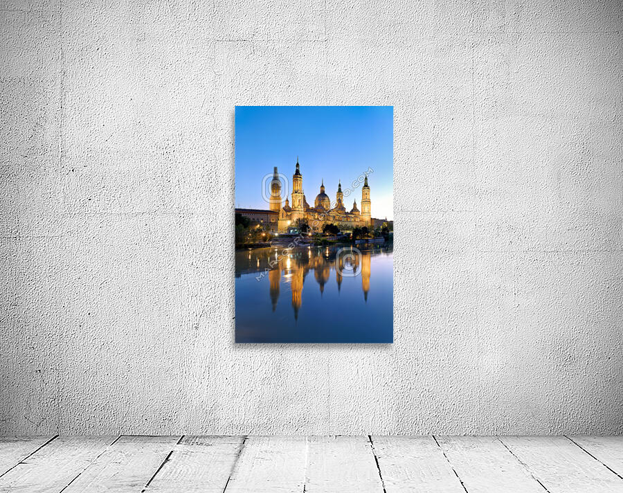 Zaragoza. Saragossa. Aragon. Spain. Cathedral Basilica of Our Lady of the Pillar and river Ebro at sunset Wall Preview