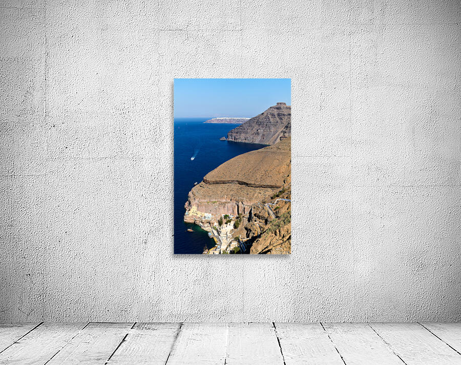 Santorini caldera with cliffs deep blue sea port and distant  Wall Preview