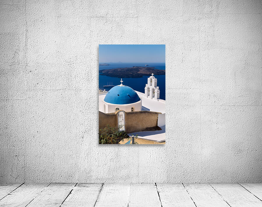 Santorinis iconic blue dome church and caldera seascape. Wall Preview