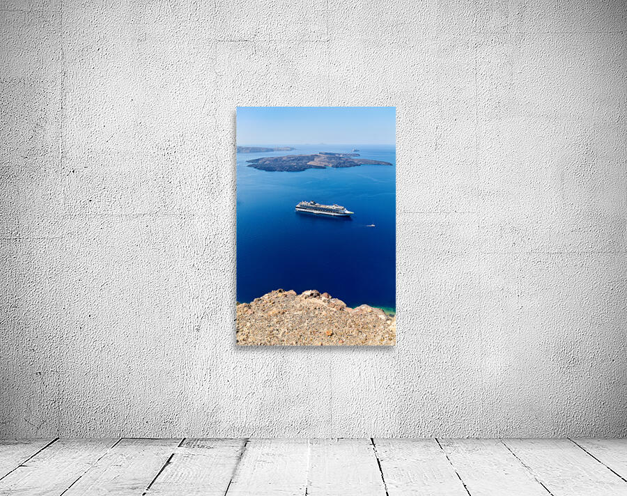 Cruise ship in deep blue sea volcanic islands rocky foreground Wall Preview