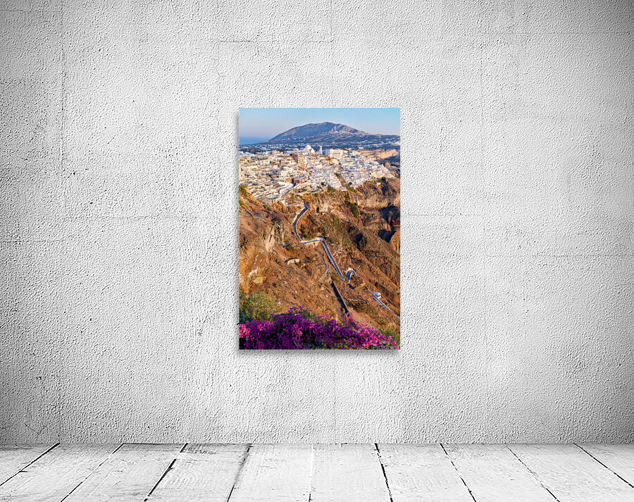 Picturesque Santorini cliffside town with winding path and vibra Wall Preview