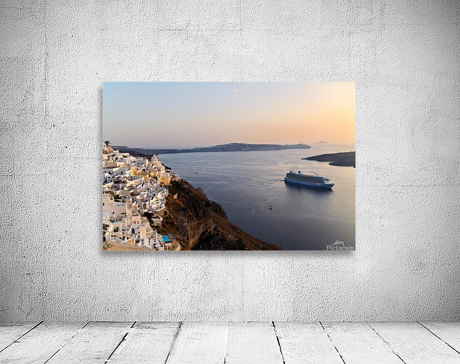Santorini village and cruise ship at sunset. Wall Preview
