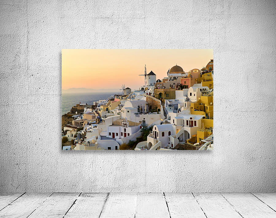 Whitewashed Santorini village and windmills at sunset over the s Wall Preview