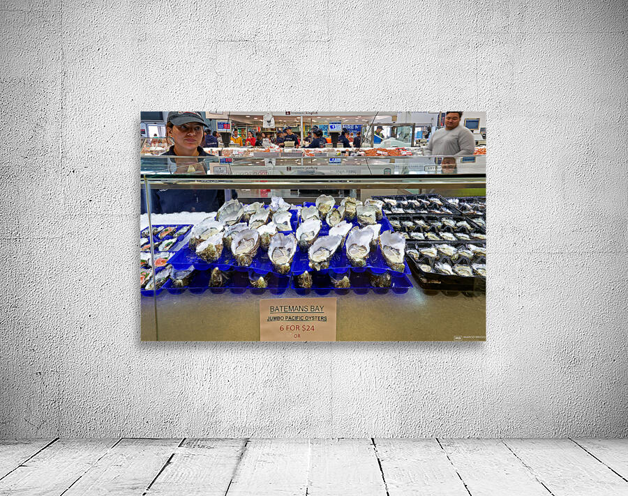 Fresh oysters on display at a seafood market. Wall Preview