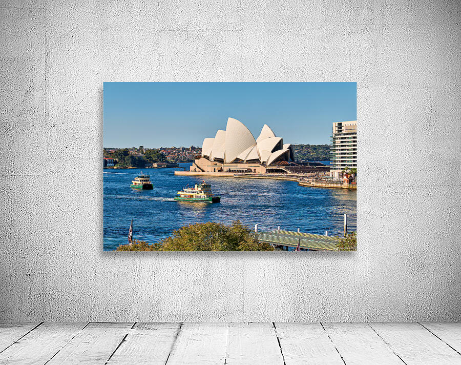 Sydney Opera House and ferries on a sunny day. Wall Preview