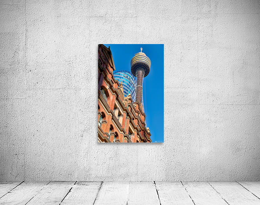 Sydney Tower and J.P. Morgan building against blue sky. Wall Preview