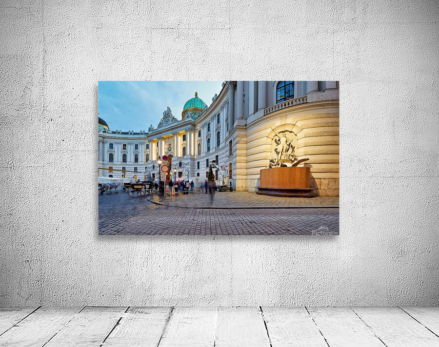 Illuminated Hofburg Palace Vienna with people and horse carria Wall Preview
