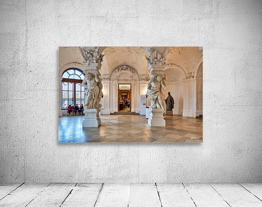 Ornate Baroque hall with sculptures and visitors. Wall Preview