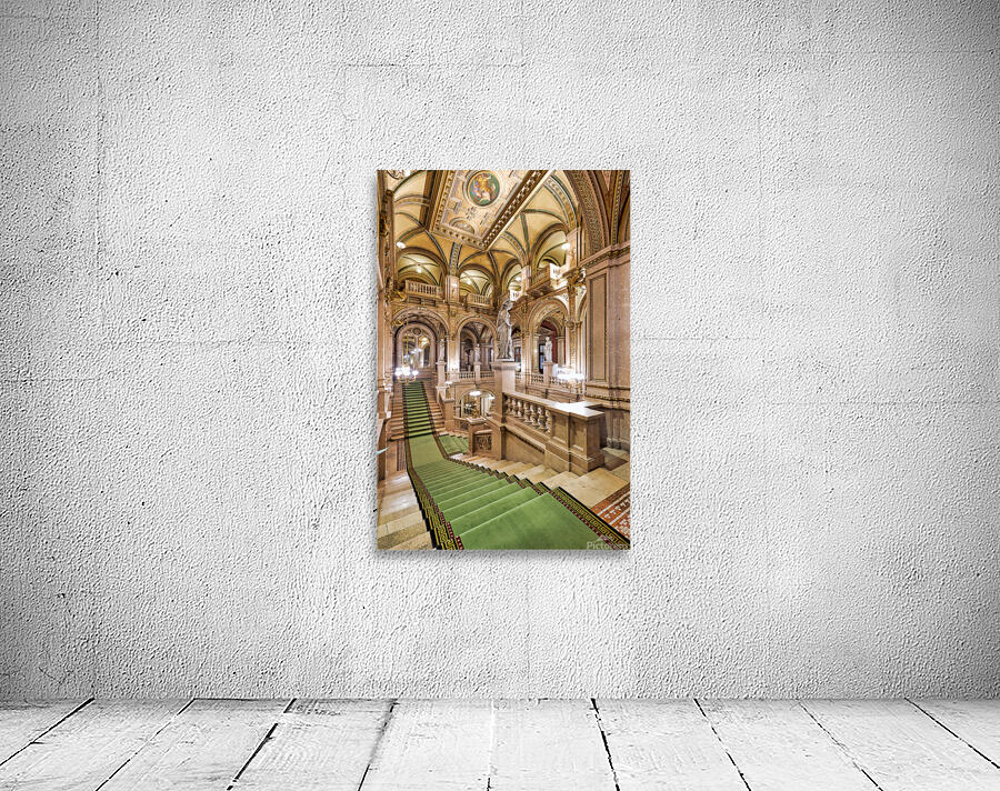 Ornate grand staircase with green carpet and classical statues. Wall Preview