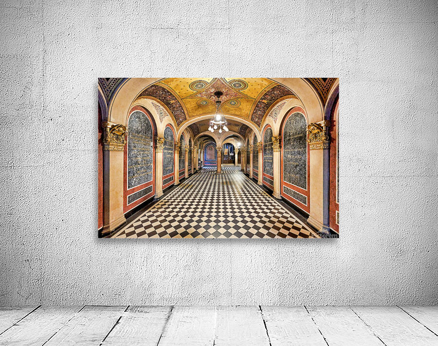 Historic church corridor with ornate arches and checkered floor. Wall Preview