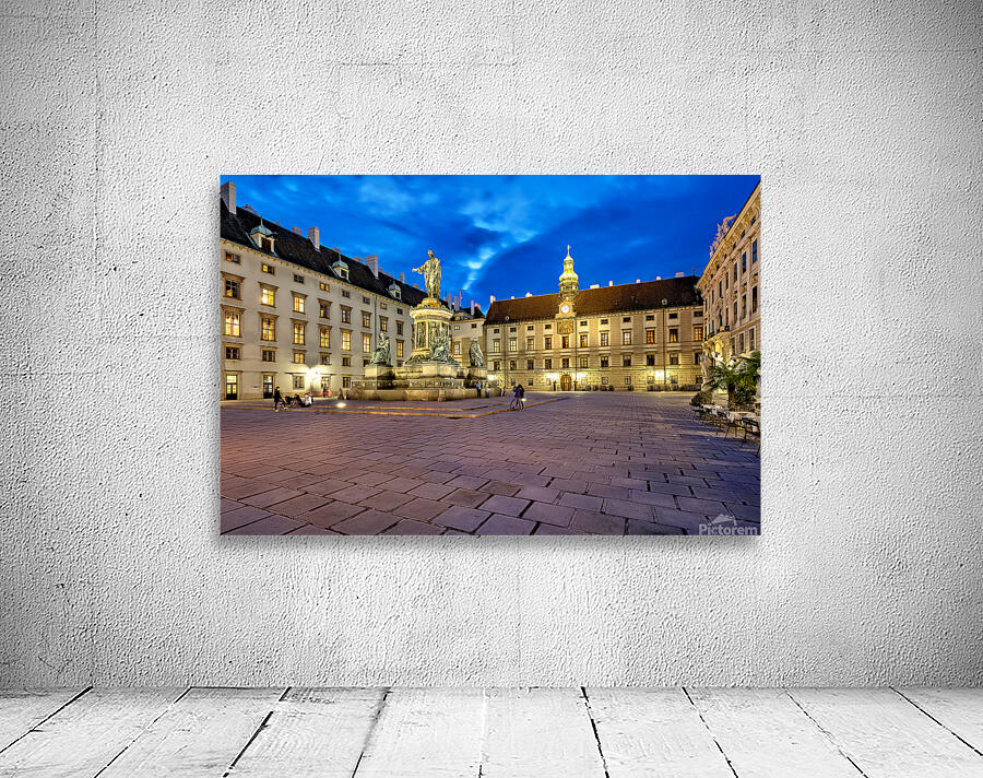 Hofburg Palace square at night with illuminated buildings and st Wall Preview