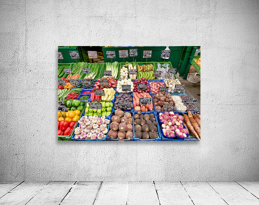 Colorful fresh vegetables and fruits displayed at a market stall Wall Preview
