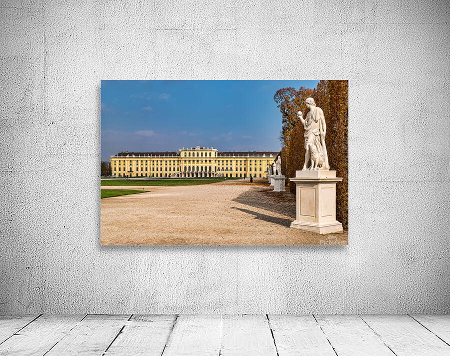 Schönbrunn Palace Vienna with statues and autumn trees. Wall Preview